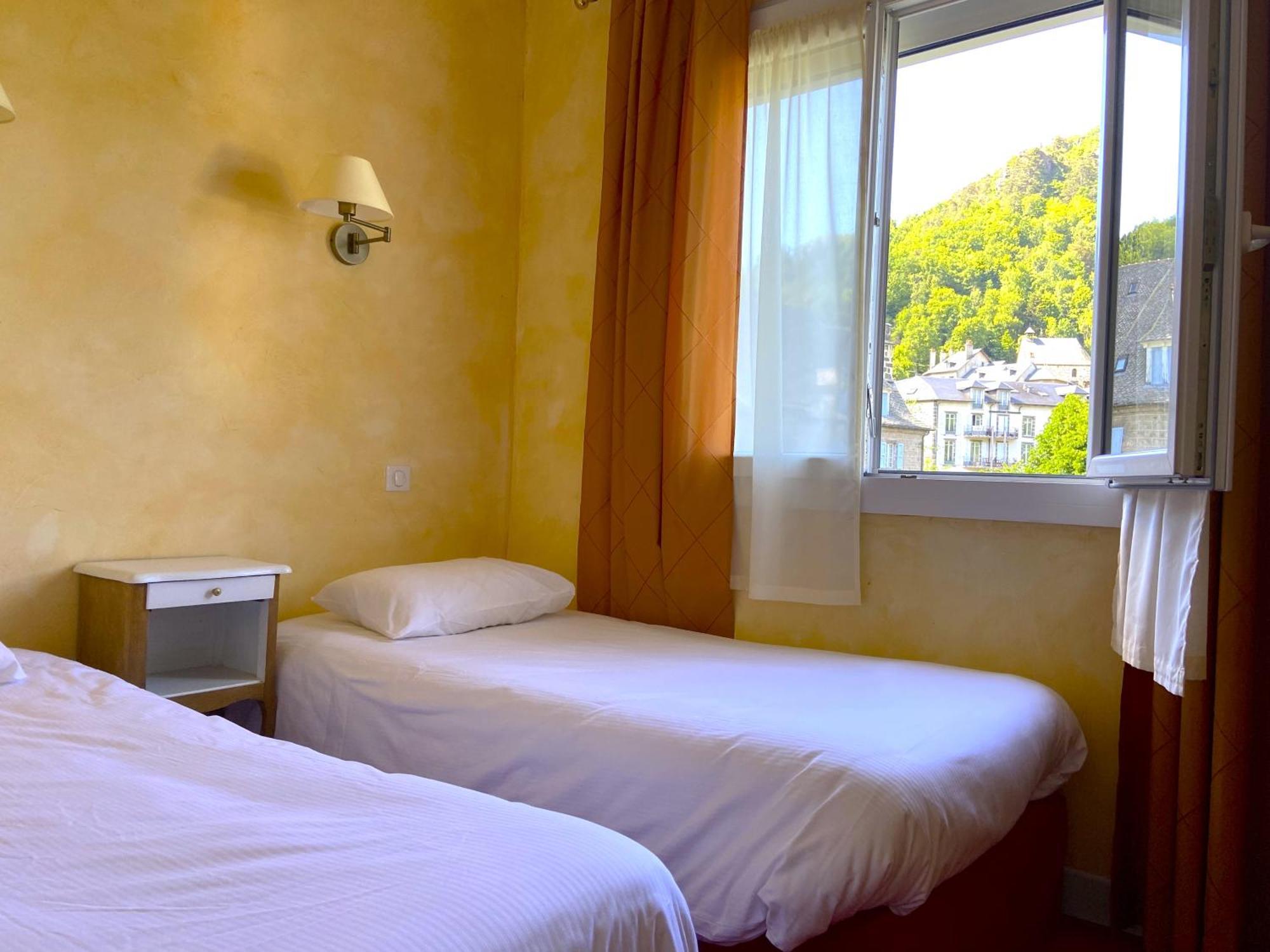 Hotel Beausejour Vic-sur-Cère Rum bild